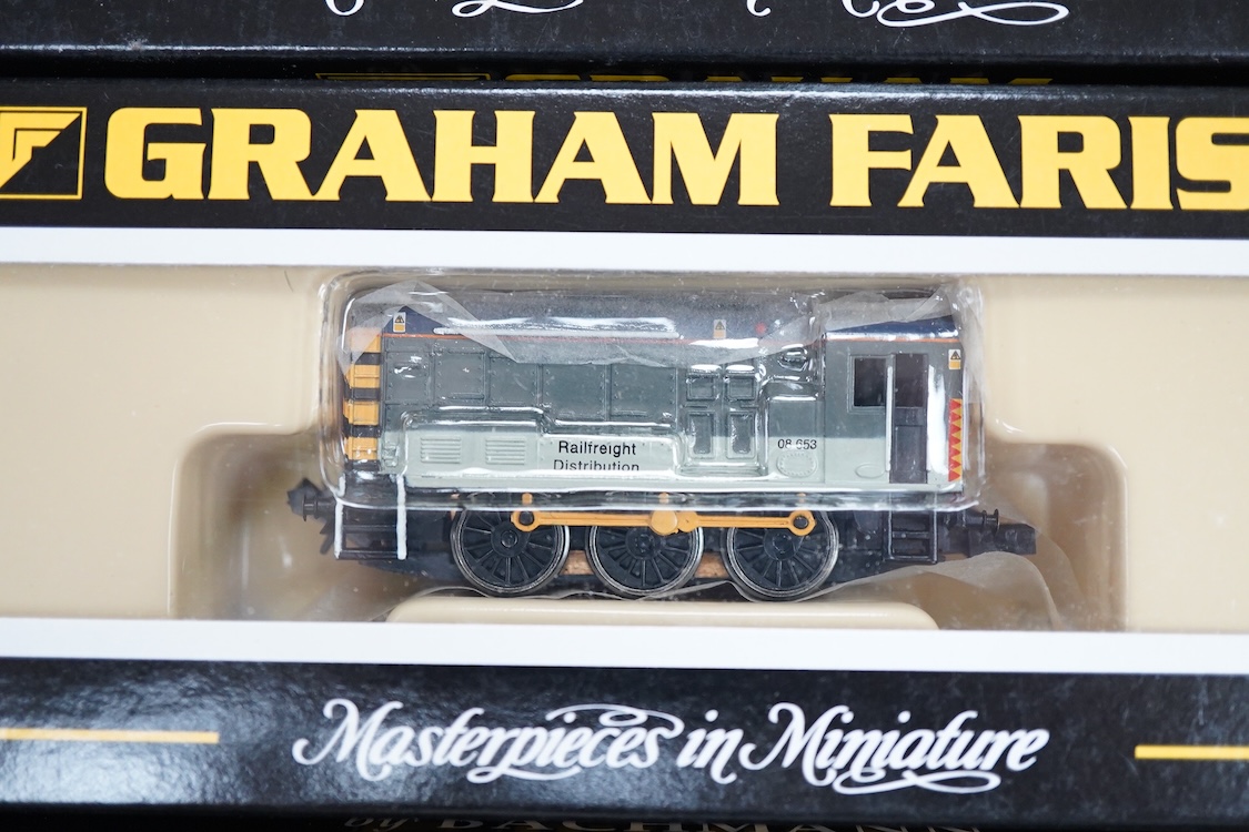 Four boxed Graham Farish N gauge railway Class 08 0-6-0 diesel locomotives; a BR, D4019 (1005), a Railfreight Distribution, 08 653 (371-000), an EWS, 08933 (371-002) and a Thomas 1, 08500 (1006).